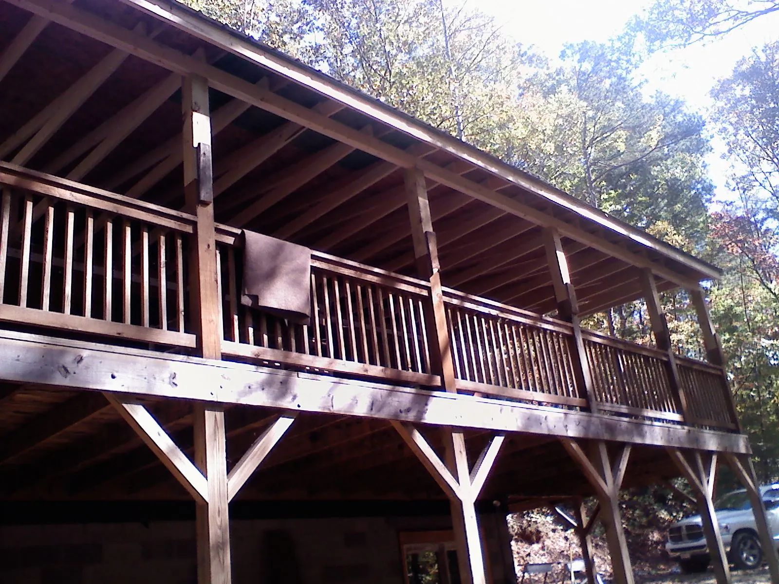 Timber framing under a new elevated porch and deck — Roof Leak Repair in Valley Stream by Roofing Brothers